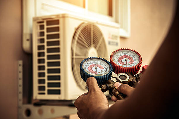 Professional Air Conditioning Service technician working in Stuart, FL